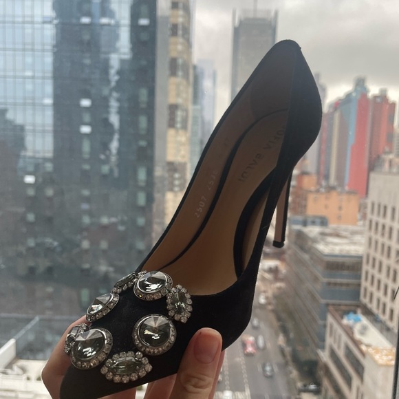 Italian high heel shoes with diamond embellishments.